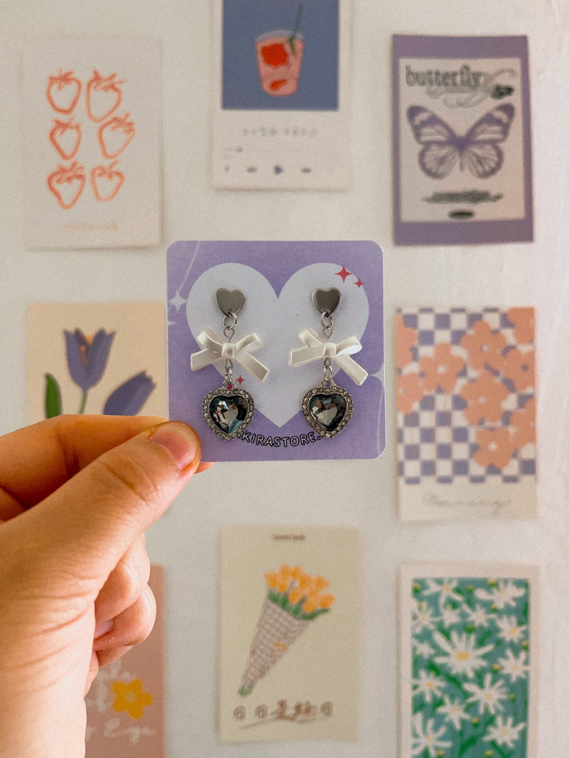 aros lazo blanco corazón negro