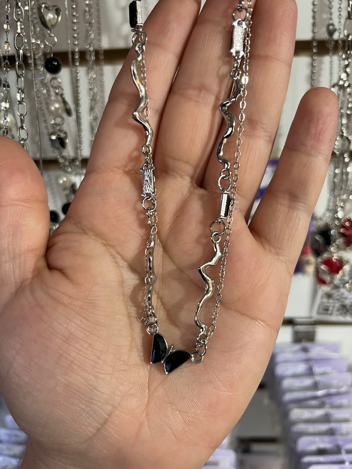 collar mariposa negra