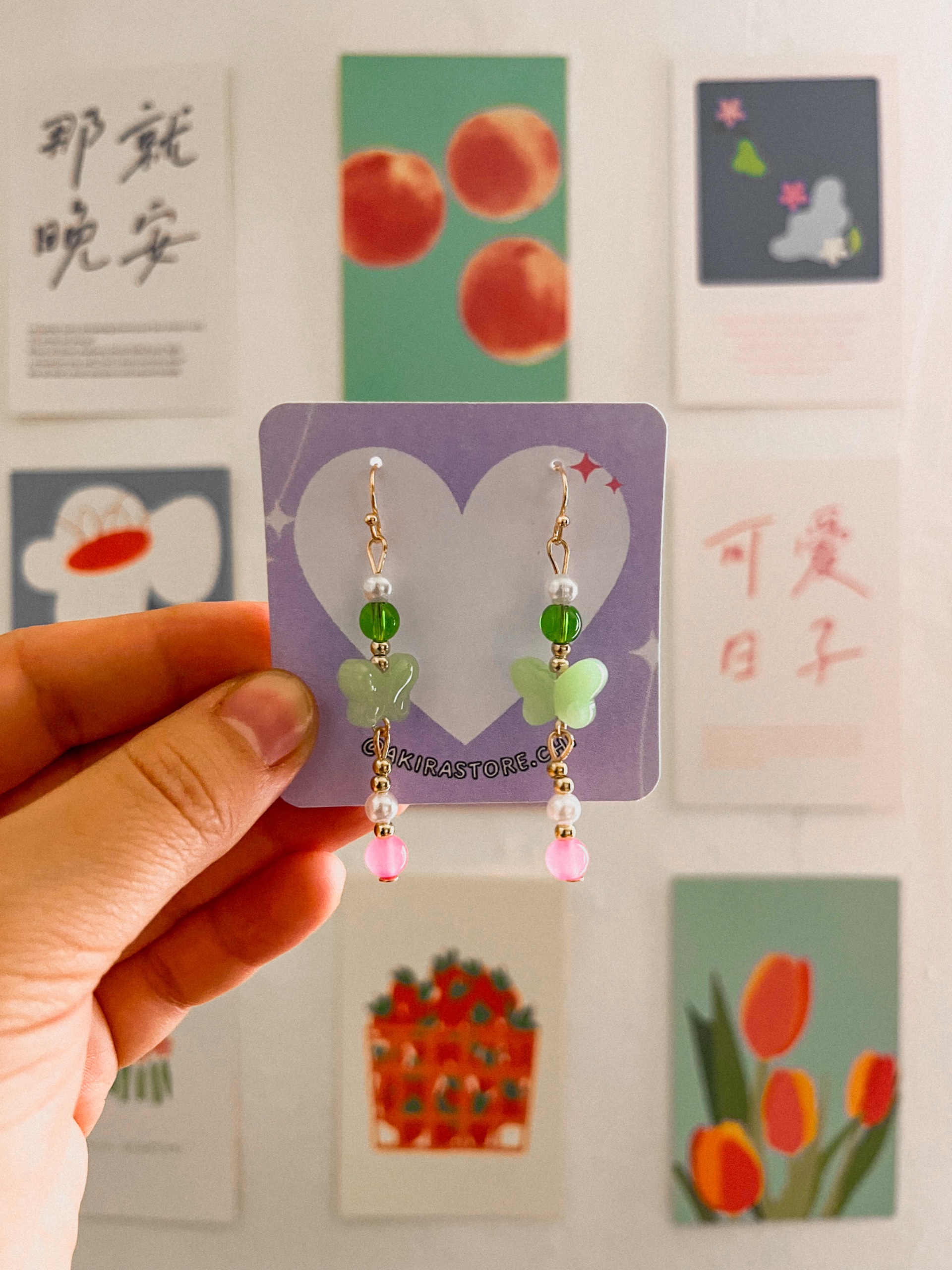 aros mariposa verde con rosado 1